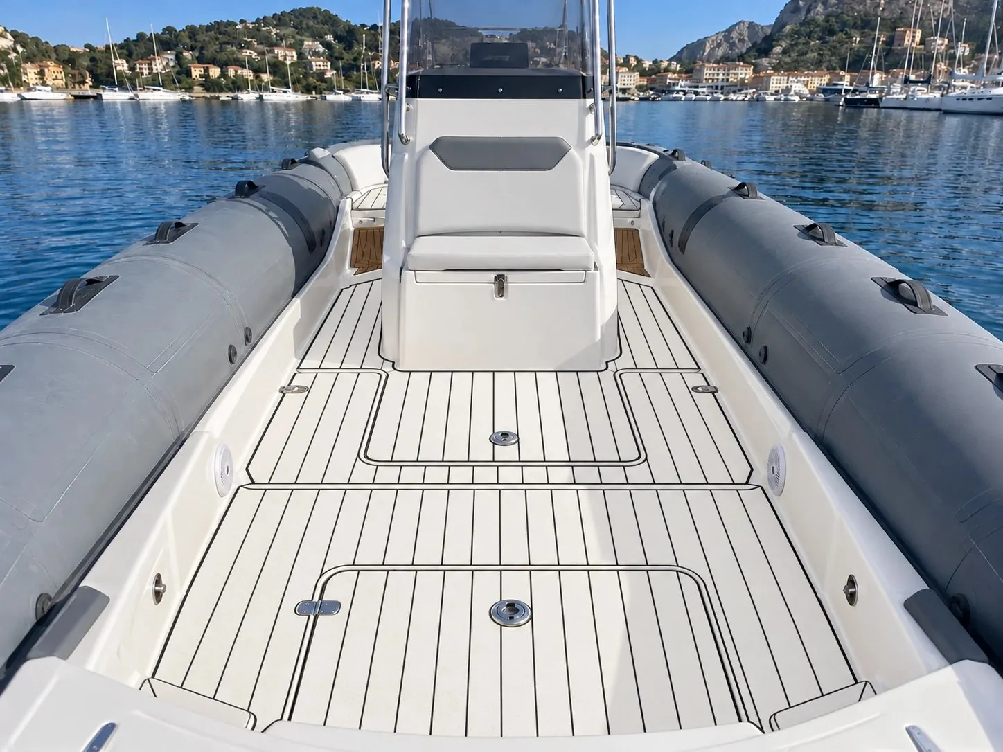 After: Walking surfaces, side decks and boarding platforms of the inflatable boat, light cork